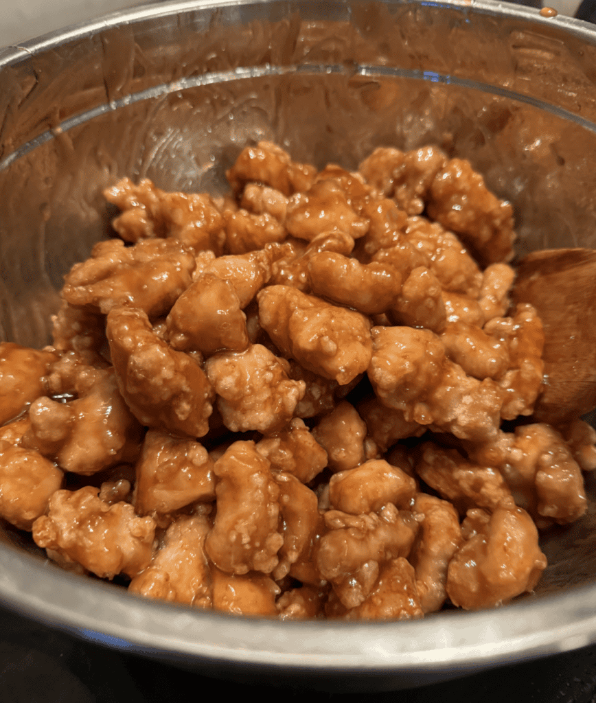 Delicious crispy gluten-free sesame chicken with a savory sauce, better than takeout. Perfect for a.