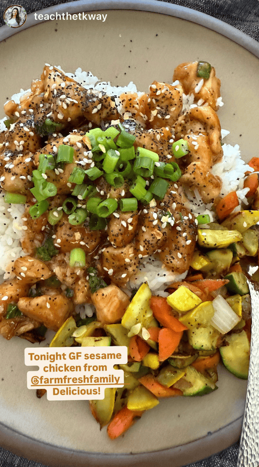 Crispy gluten-free sesame chicken with vegetables on rice, perfect for takeout-style dinner.