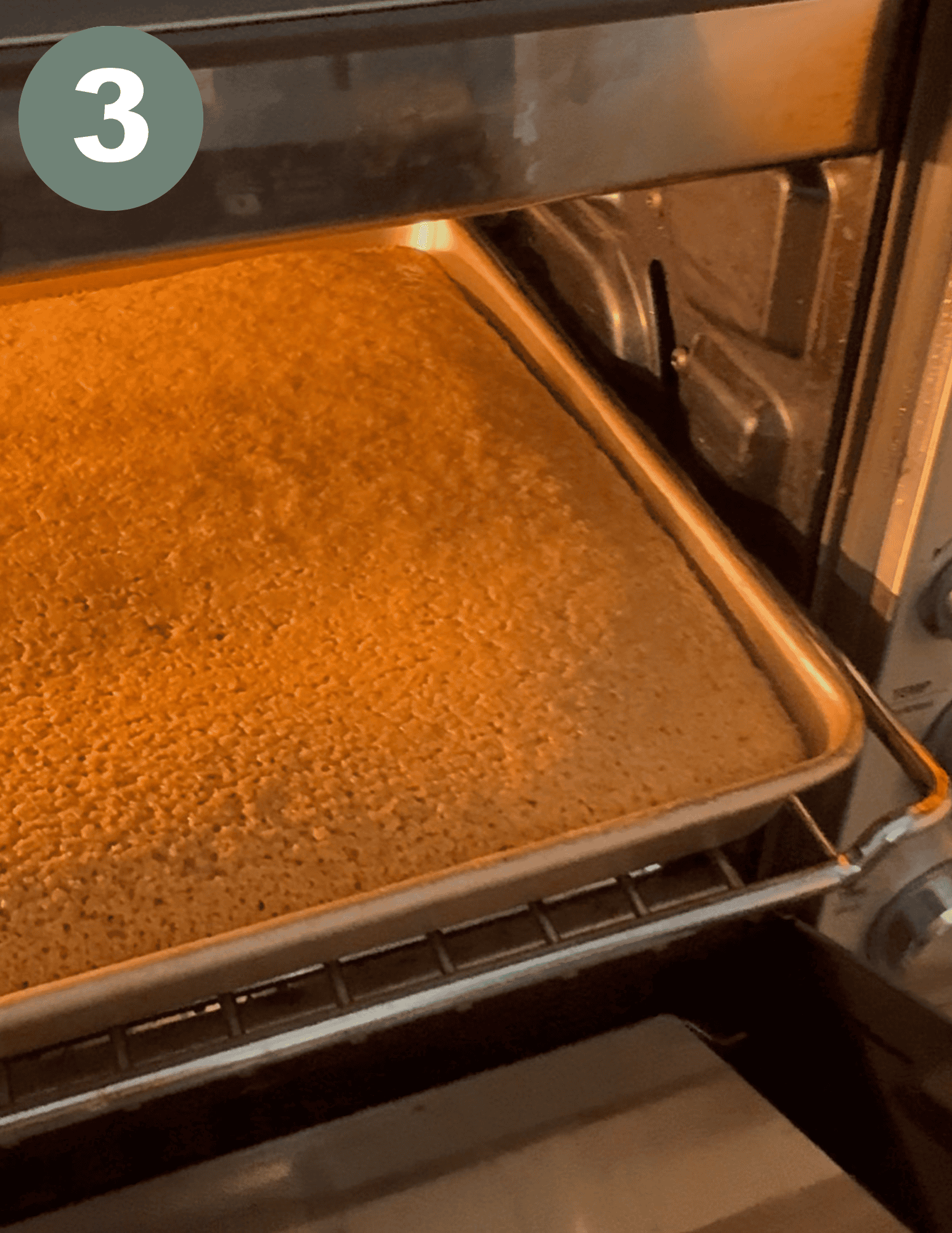Baked gluten-free Valentine’s Heart Cakes on baking sheet in oven.
